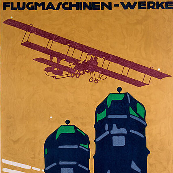 Historisches Plakat mit stilisierten Frauentürmen, darüber Doppeldecker-Flugzeug und Schrift „Flugmaschinen-Werke“.